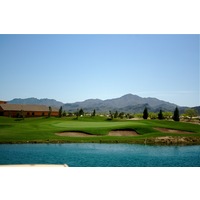 Quarry Pines Golf Club's par-4 fourth hole plays over water on the approach shot.