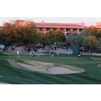 Kevin Sutherland putts out on the fourth green at the TPC Scottsdale Stadium Course during the 2012 Waste Management Phoenix Open.