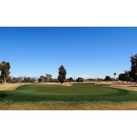 The sixth at Camelback Golf Club's Padre Course is a dogleg-right par 4 around a lake.