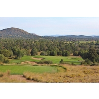 Most golfers try to drive the 15th green at Talking Rock Golf Club from the elevated blue tees 309 yards away.