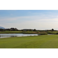 The ninth (pictured) and 18th holes at Talking Rock Golf Club are both par 5s separated by a pond near the greens.